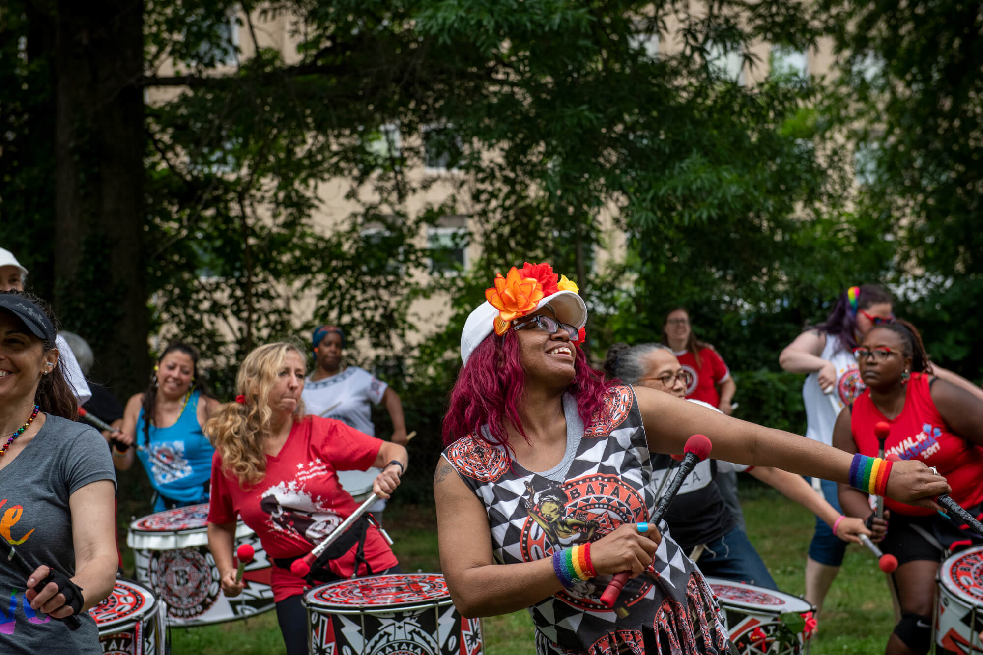 Image of Batalá Washington DC band members playing a song in the park