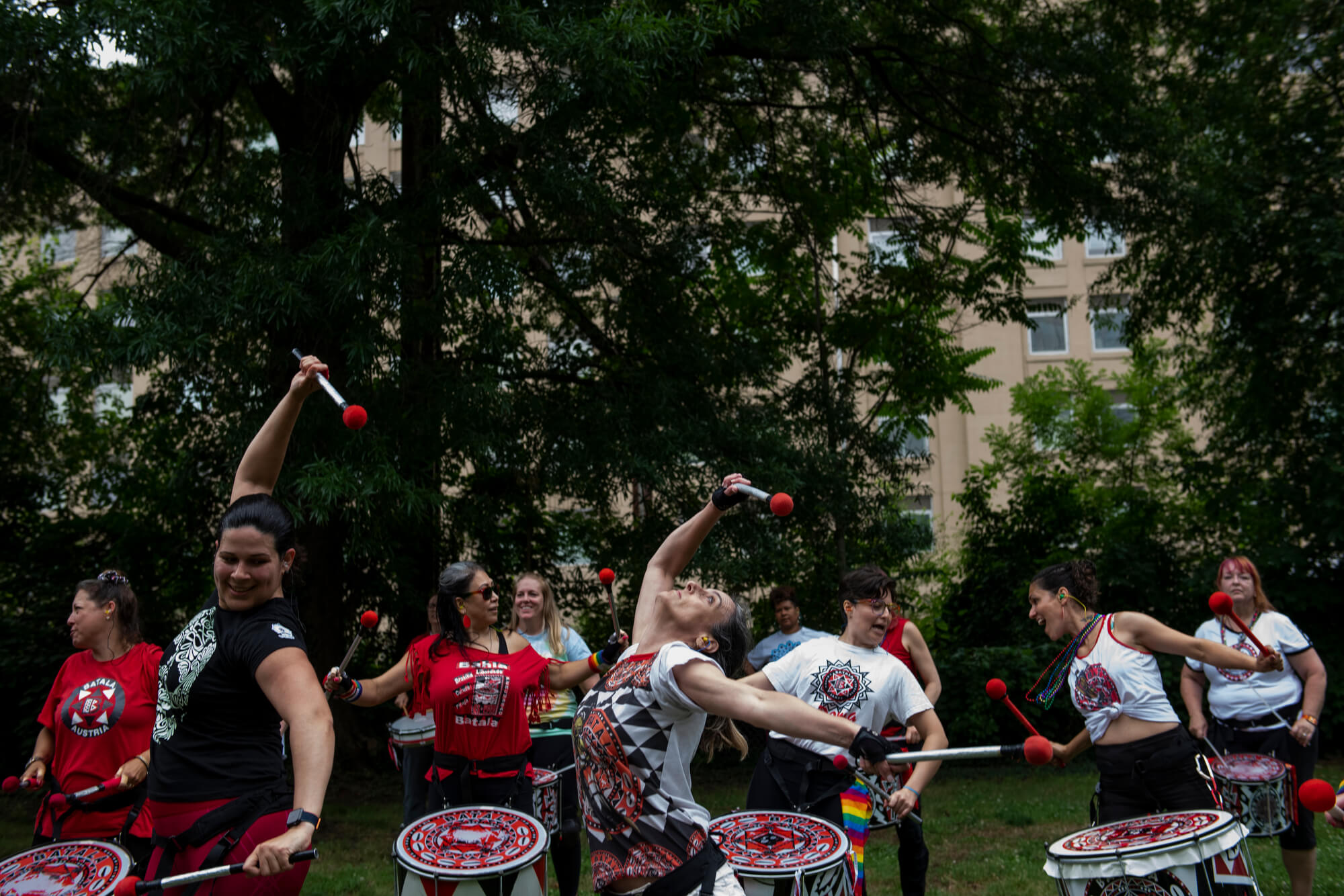 Image of Batalá Washington DC band members playing a song in the park