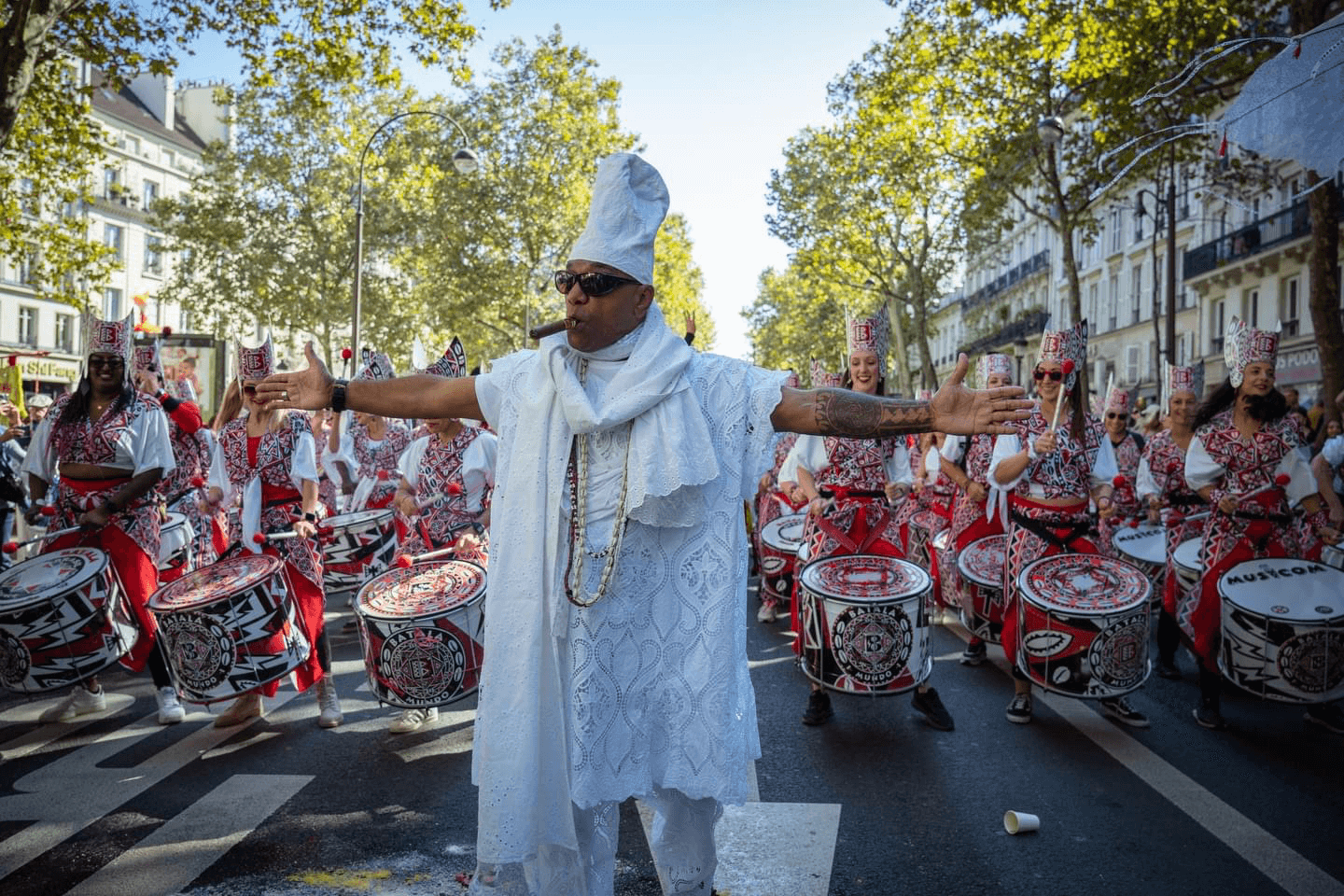 Image of Batalá's founder, Giba, leading the band